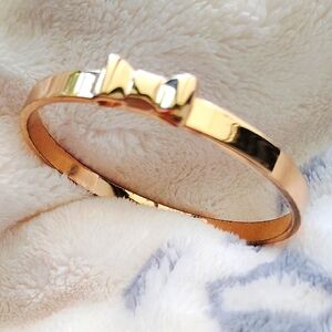 Elegant Gold-tone Kate Spade Bow Clamper Bracelet
